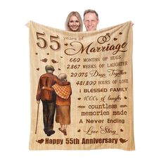 a 50th anniversary gift blanket with an image of two people holding each other