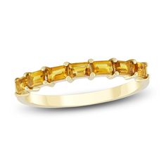 Make your celebration sparkle with this sunny citrine stackable ring. 10K yellow gold Seven baguette-cut natural citrines—the birthstone of November—are set east-to-west Mix and match with other gemstone rings as a way to honor loved ones' birthdays (sold separately) Baguette, Citrine Birthstone Ring, Birthstone Stacking Rings, Diamond Fashion Jewelry, November Birthstone Ring, Jared The Galleria Of Jewelry, Yellow Gemstones, Anniversary Jewelry, Popular Jewelry