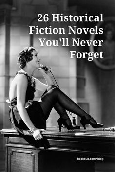 a woman sitting on top of a desk talking into a microphone with the words 26 historical fiction novels you'll never forget