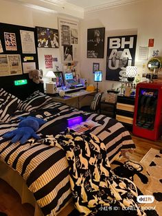 a bed room with a neatly made bed and lots of clutter on the floor