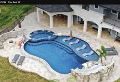 this is an aerial view of a swimming pool