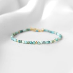 "This hand made bracelet showcases a stunning selection of genuine Turquoise gemstones. This makes a wonderful gift for someone with a December birthday, or any Turquoise lover in your family or friend circle. All jewelry will arrive in an elegant, ready-to-gift drawstring pouch within a gift box. To find your bracelet size, simply measure the circumference of your wrist by wrapping a string around it and measuring the length of the string. If you are shopping for someone else and are unsure of Turquoise Beaded Bracelets, Friend Circle, December Birthstone Jewelry, Stone Bead Jewelry, Main 1, Healing Gemstone Bracelets, December Birthday, Turquoise Bead Bracelet, Beaded Jewelry Designs