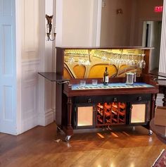 a wine rack in the middle of a living room