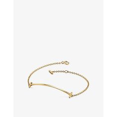 Find TIFFANY & CO. T Smile 18ct Yellow-gold Bracelet M on Editorialist. | Tiffany & Co. 18ct yellow-gold bracelet100% 18ct yellow goldSpring-ring clasp fasteningCurved bar, cable chain, logo-embossed charm at closureUse specialist cleanerMade in ItalyPlease use a soft, dry polishing cloth Smile Bracelet, Tiffany Bracelet, Hand Jewelry Rings, Chain Logo, Tiffany And Co Bracelet, White Gold Bangle, Tiffany T, Tiffany Bracelets, Yellow Bracelet