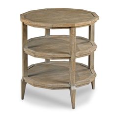 a round wooden table with three shelves on each side