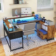 a computer desk with two monitors and a keyboard on top of it in an office