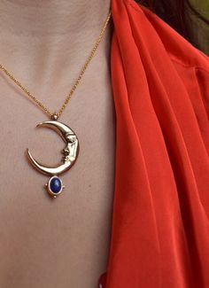 In the Ancient mythology Zirna was an Etruscan goddess of the waxing moon. The moon is the symbol of the soul, the closet celestial body of the planet Earth. This is a sculptural pendant, carved in wax, casted in Bronze, set with a beautiful Lapis Lazuli gemstone & polished to a beautiful burnished gold finish. It is harmonized with a long bronze cable chain. Circumference is 42 cm. Looks great layered on it's own but do not hesitate to pair it with other chain necklaces for a truly unique look Spiritual Moon Jewelry With Sun And Moon Design, Symbolic Moon Charm Pendant Jewelry, Mystical Sun And Moon Pendant Necklace, Symbolic Moonstone Jewelry With Moon Charm, Mystical Sun And Moon Design Pendant Necklace, Spiritual Crescent Moon Phase Necklaces, Spiritual Crescent Moon Phase Necklace, Mystical Moon-shaped Jewelry With Moon Phase Detail, Spiritual Moon-shaped Necklace With Coin Pendant