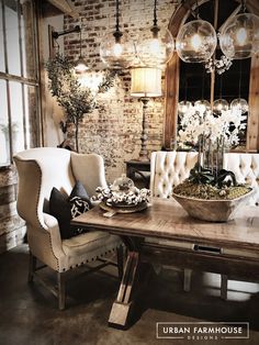 a dining room table with two chairs and a bowl on it