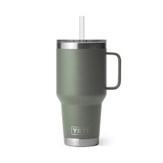 the yeti travel mug has a straw in it