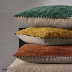 four pillows stacked on top of each other