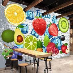 a wall mural with fruits and ice cubes on it