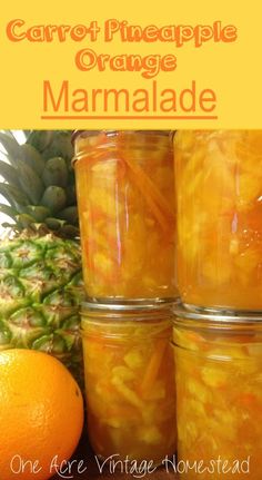 four jars filled with carrot pineapple orange marmalade next to an orange and pineapple