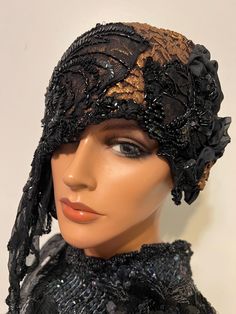 This is beautiful Ladies lace hat , headdress, wrap is in flapper style has my handmade design is in version of my collection fabulous 20's style hats and accessory heirloom Ludascrafts"LudasHatBoutique". Ladies wrap for any occasions,daytime, church. You can wear it many different ways with any dress and will look great costume outfits Era. Hat made from  stretchy  black lace, adorned antique style artwork is in Millinery style, floral, beaded accent,, velvet floral black lace fringes both sides,trim , family pattern early  and later 1890's, fully stitching by my  hands Measurement: Inside: 24". Mannequin's head about 22". Check measure around your ears, flapper hat fit over them and low on the brow. Crown: 16" .You can wear it many different ways with any dress and will look gorgeous.Onl Fitted Flapper Mini Hats For Kentucky Derby, Flapper Headpieces For Costume Party, Gatsby Style Short Brim Costume Hats For Evening, Evening Gatsby Costume Hat With Short Brim, Fitted Party Bonnet Cap, Party Costume Cap One Size, Fitted Cap Fascinator For Party, Fitted Party Cap Fascinator, Elegant Party Bonnet One Size