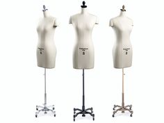 three mannequins are standing on wheels and each has a different type of dress form