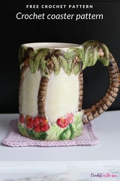 a coffee mug with palm trees painted on it and the words free crochet pattern