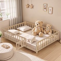 a teddy bear sitting on top of a bed in a room with white walls and wooden floors