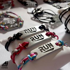 "RUNNING JEWELRY - Show your love for running with this unique ATHLETE INSPIRED, RUN bracelet. You have accomplished the goal--or maybe it is on the horizon! This unique, lightweight and comfortable running bracelet will be a constant reminder of your hard work and dedication. Metal \"RUN\" cut out bracelet on 2mm round leather cord or satin rope with lobster clasp. Bracelet \"plate\" Dimensions: Length 3.740cm x Width 1.155cm Thickness 1.95 mm (0.077 in) Bracelet size available in 6.5\", 7\", 7 Runner Party Bag Gifts, Long Dostance Runner Gifts, Runner Boyfriend Gifts, Runners Jewelry, Running Bracelet, Running Jewelry, Running Gifts, Sports Bracelet, Gifts For Runners