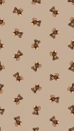 a brown teddy bear pattern on a tan background