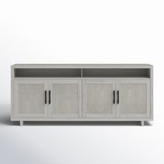 a white cabinet with two doors and three drawers