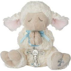 a stuffed animal with a cross on it's chest