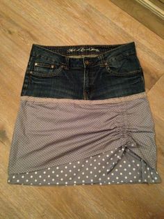 three different colored skirts sitting on top of a wooden floor