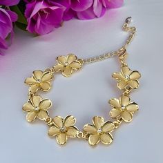 This plumeria bracelet features cubic zirconia stones in each plumeria flower. Easy to put on and take off with lobster closure clasp. The plumeria flowers on this bracelet measures 18mm width. This bracelet has an attached 3 inch extender so you can adjust to your size from 6.5 - 9 inch wrist.  Here is the matching earrings: https://www.etsy.com/listing/1774987703/plumeria-stud-earrings-hawaiian-earrings?click_key=f3a4bd8dd45cc1d5495ac734b87db37181ed5605%3A1774987703&click_sum=6050e810&ref=shop Crystal Jewelry Necklaces, Hawaiian Bracelets, Hawaiian Jewelry, Jewelry Accessories Ideas, Jewelry Lookbook, Ear Jewelry, Bracelet Gift, Things To Buy, Matching Earrings