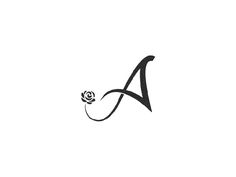 the letter a with a rose on it is drawn in black ink and has an elegant design