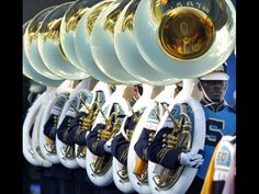 a marching band is lined up and ready to play