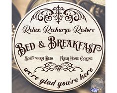 a sign that says relax, recharge, restore bed & breakfast and we're glad you're here