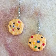 Rainbow Chip Cookie Novelty Fashion Pierced Earrings Nwot Handcrafted, Dime Size Measures .65” Surgical Steel French Wires Silver Toned. Dangle Style. One Cookie From One Pair Has A Tiny Hairline Fracture At Top Measuring 2/10” That Does Not Affect The Integrity Of The Cookie Cabashon. Please See Photos. Earrings Are Strong And In Overall Good Condition. One Pair Flawless.