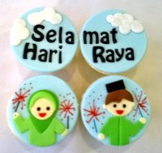 three cupcakes that have been decorated to look like children's avatars