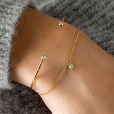 3mm heart shaped faceted white sapphire (0.16ct., AA quality) Solid 14k gold rope chain and lobster clasp. The Small/Medium bracelet measures 7" and can be adjusted with three length options ranging from 5.5”-7”. The Medium/Large bracelet measures 8" and can be adjusted with three length options ranging from 6.5”-8”. If "Custom Length" is chosen, a member of our Customer Care Team will reach out to finalize your bracelet length details. Signature Melanie Casey natural diamond drop on the chain. Be Still My Heart, Hammered Bracelet, Melanie Casey, Large Bracelet, Diamond Crown, Gold Rope Chains, Twisted Band, Necklace Chain Lengths, Band Jewelry