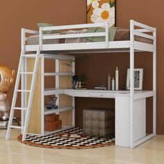 a white bunk bed sitting on top of a hard wood floor next to a brown wall