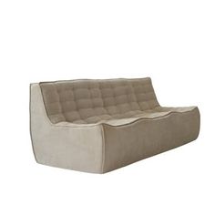 a couch that is sitting on top of a white surface with no one around it