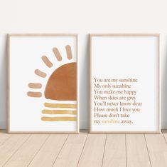 two framed posters with the words you are my sunshine