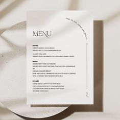 a white plate with a menu on it