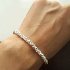 This men's bracelet is a perfect gift for boyfriend,father,husband fiance and fit for wearing always and on all occasions. Material: 925 sterling silver Size: 8.5 inch Weight: 13.grm apprx Processing Time ❤️ Ready to dispatch in 3 to 5 days Shipping Time ❤️ For USA  3 TO 4 WEEKS FOR UK   2 TO 3 WEEKS FASTE DELIVERY IS AVAILABLE AND TIME TAKEN IS 10 TO 15 DAYS. MESSAGE US IF YOU REQUIRE ❤️ TIPS FOR SILVERCARE It is very much normal for silver item to get tarnished ,even sterling silver also but i Boys Silver Bracelet Design, Boys Bracelets Silver, Boys Rings Design Silver, Simplistic Jewelry, Silver Bracelet For Men, Silver Rakhi, Gents Bracelet, Silver Bracelet Designs, Boys Bracelets