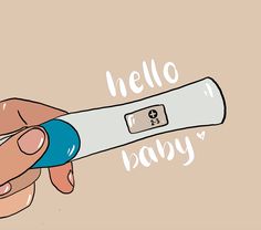 a hand holding an electronic thermometer with hello baby written on it's side