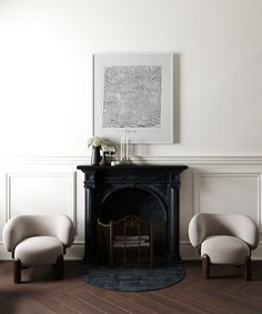 three white chairs in front of a fireplace with a painting on the wall above it