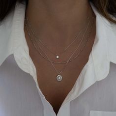 This delicate beaded chain necklace is a must-have staple piece! It's great for layering, but also adds a sweet minimalist touch to any look. Made of 925 Sterling Silver 14K Gold or Rhodium plating Nickel-free & Hypoallergenic Lengths include 3" extender Lobster clasp closure Matching bracelet available! Everyday Silver Necklace, Necklace Layering Ideas Silver, Layering Necklaces Silver, Layered Jewelry Silver, Necklace Layering Silver, Simple Beaded Necklace, Thrift Manifest, Layered Necklace Silver, Simple Beaded Necklaces