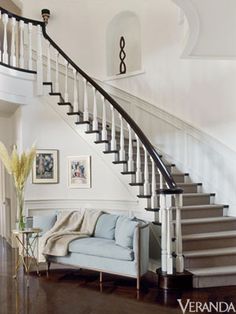 Grand Staircase in the Foyer JLo Jennifer Lopez Home, Veranda Magazine, Foyer Staircase, Escalier Design, Wood Staircase, Classic Interiors, Stair Case, Curved Staircase, Home Luxury