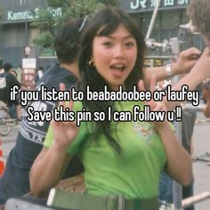 a woman in a green shirt with her hands up and the words if you listen to beat