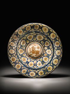 a decorative bowl with an elaborate design on it