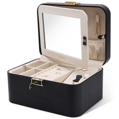 PRICES MAY VARY. Leather + Velvet lining + Lock + Key Kamier Men Jewelry Box Hidden Design: A large mirror is built into the lid, there are 10 necklace hooks and two elastic pleated pockets inside the mirror to fix the necklaces in place. Double Layer & Large Storage Space: In the first layer, there are 1 earrings plate, 2 extra removable spaces and 8 rings holders, In the second layer, there is a removable space to store watches or something larger keepsakes. Double Safeguard: Double lock desig Jewelry Box With Lock, Necklace Storage, Double Lock, Leather Jewelry Box, Travel Jewelry Box, Jewelry Organizer Box, Travel Jewelry Case, Gift Box Packaging, Large Mirror