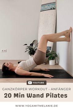 a woman is doing yoga in front of a surfboard with the caption, gaz korpfer workout - anhanger 20 min wandd pilates