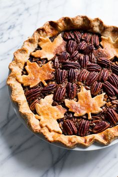 a pecan pie on a marble table