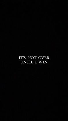 the words it's not over until i win are lit up in the dark