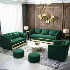 a living room filled with green couches and chairs next to a white table on top of a rug