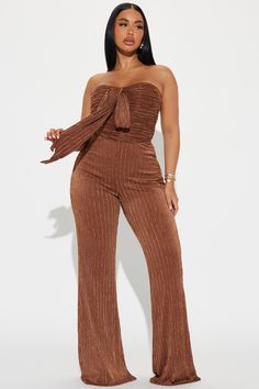 Available In Brown. Jumpsuit Strapless Sweetheart Neckline Front Bow Detail Pant Lined Wide Leg Stretch Inseam= 34" Self: 54% Polyester 38% Nylon 8% Spandex Lining: 100% Polyester Imported | Sunkissed Jumpsuit in Brown size XS by Fashion Nova Brown Jumpsuit, Stephanie Rao, Strapless Sweetheart Neckline, Leg Stretching, Bow Detail, Sweetheart Neckline