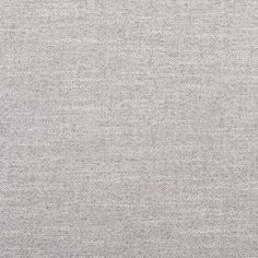 a gray background with small white dots on the top and bottom part of the fabric